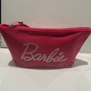 NWT Barbie Pink waterproof Cosmetics Pouch with zipper closure.